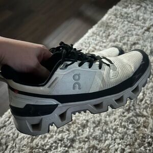 On Cloud Running Black and Cream Sneakers